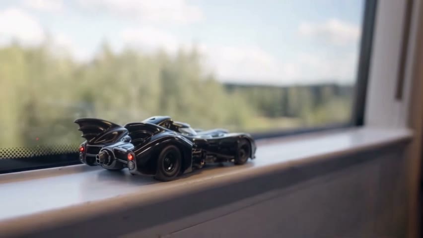 AI Toy Car to Real Car Transformation from One Photo